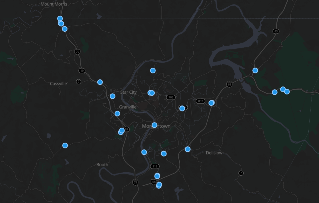 Dark street map of Monongalia County with blue dots marking Flock camera locations in and around Morgantown, Star City, and Granville, and along routes 705, 19, and 857.